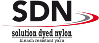 Tapijt van Solution Dyed Nylon is geproduceerd met speciale Interfloor SDN garens die over unieke eigenschappen beschikken. In tegenstelling tot gangbare tapijtgarens – waarbij alleen de buitenzijde van het garen gekleurd is – zijn SDN-garens door en door geverfd. Hierdoor is het tapijtgaren UV bestendig, kleurecht, chloorbestendig en onderhoudsvriendelijk. Interfloor tapijt van Solution Dyed Nylon